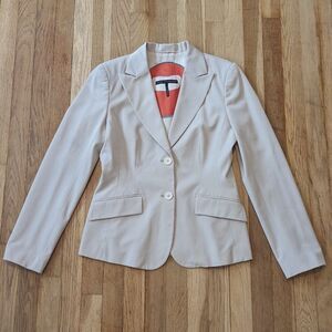 Sandra Angelozzi tan fitted women's suit jacket